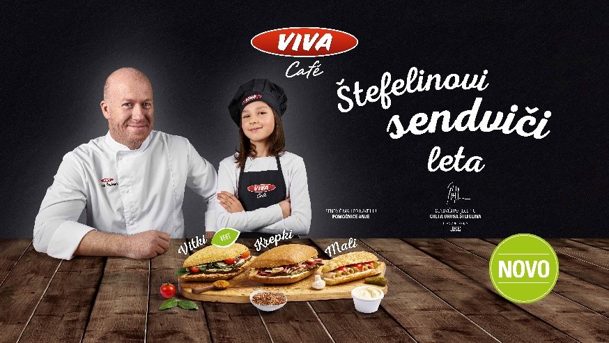 Slika, ki vsebuje besede oseba, miza, moški, držanje Opis je samodejno ustvarjen