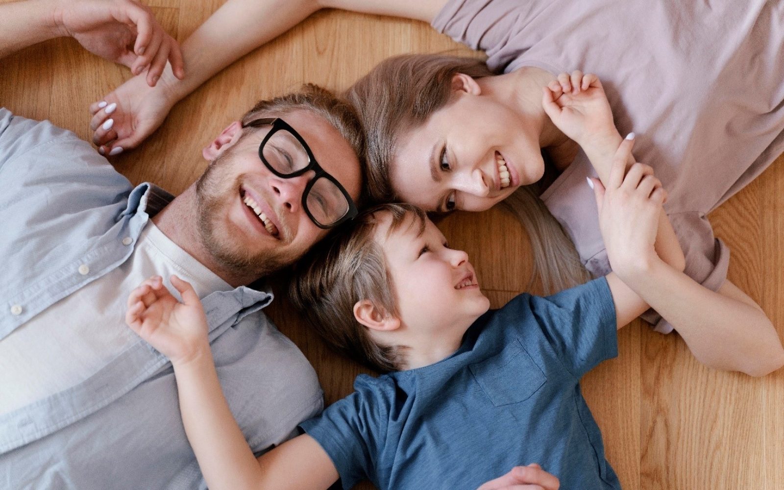 A picture containing person, indoor, laying  Description automatically generated